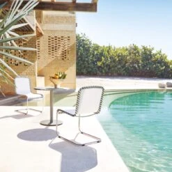 Enzo Natural Sunbrella Outdoor Armless Sling Chair -Home Furnishings Store CB2SU22 16A v3 RET 1