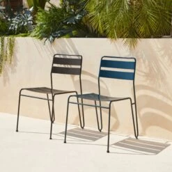 Lucinda Black Outdoor Patio Stacking Chair -Home Furnishings Store CB2SU23 15D V1 RET