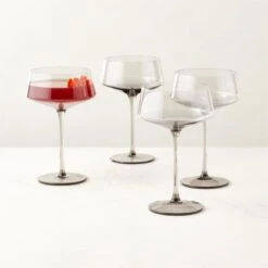 Muse Smoked Coupe Cocktail Glass Set Of 4 5 Muse Smoked Coupe Cocktail Glass Set Of 4 -Home Furnishings Store MuseSmkCpCocktailGlassS4ROS23